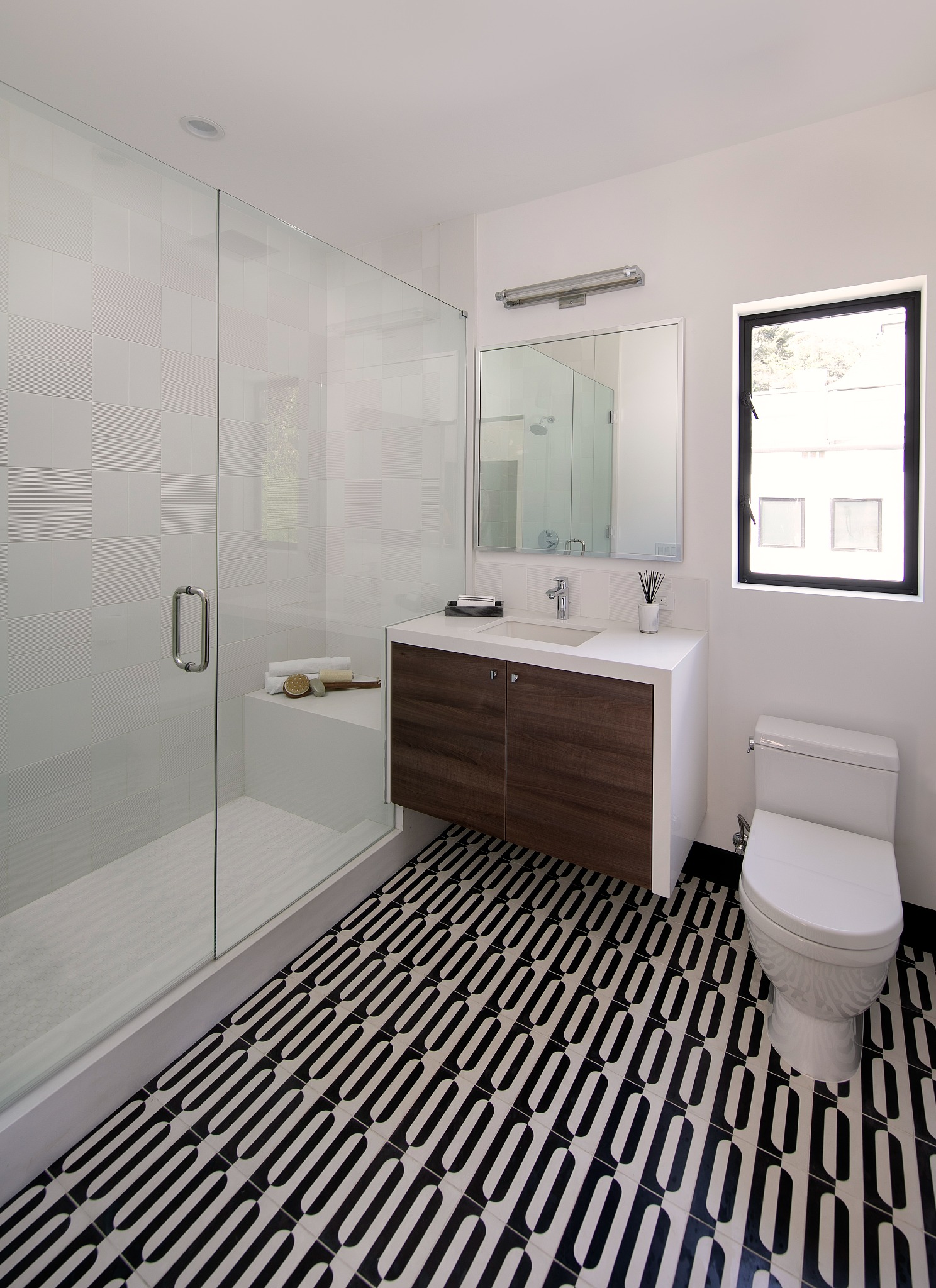 Sunset Plaza bathroom with black and white patterned floor