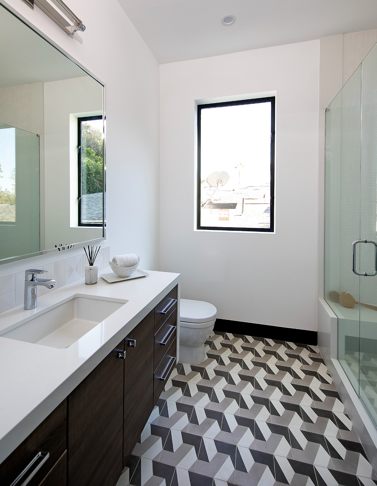 Sunset Plaza bathroom with geometric tile floor